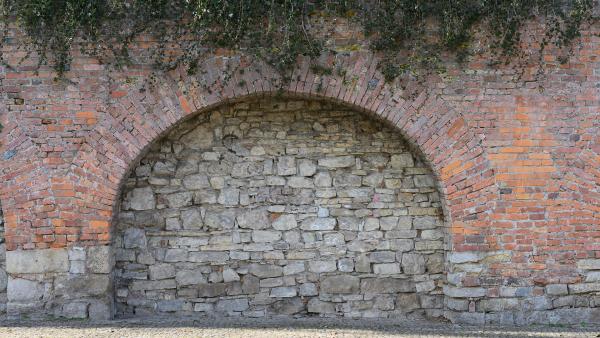 Brick arch and stone wall texture