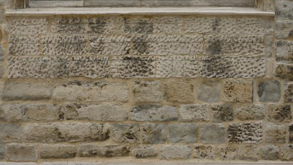 Eroded stone wall