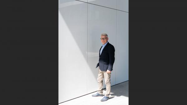 Businessman on white wall photo