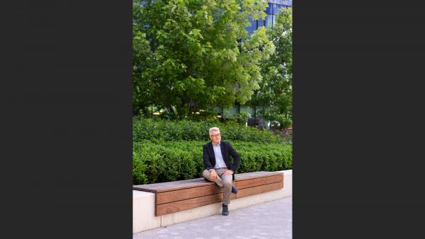 Businessman sitting on bench photo