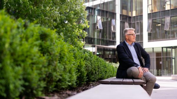 Businessman sitting on bench photo