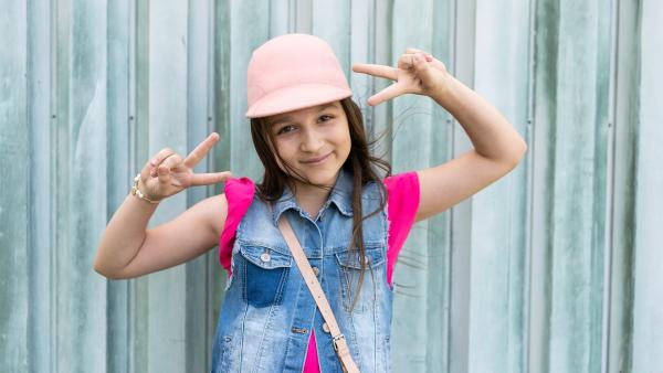 Girl in funny posture photo