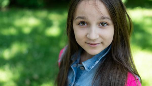 Young girl in park photo