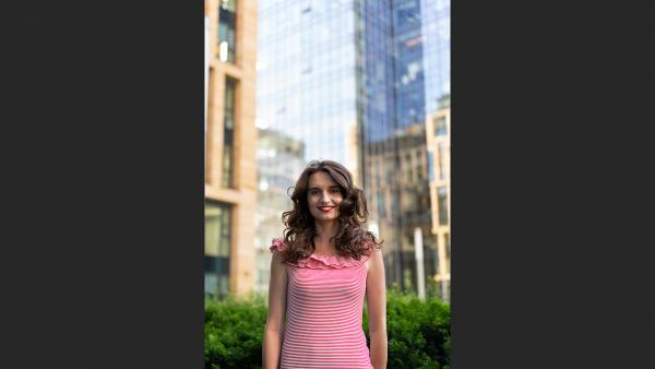 Beautiful girl in city environment