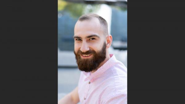 Smiling man with beard