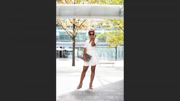 Young businesswoman in sunlight