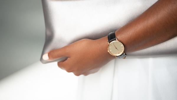 Woman elegant watch on hand