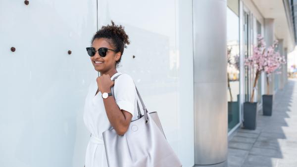 Woman walking on city center