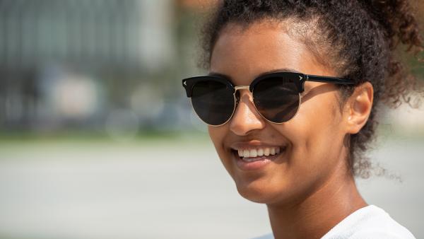 Closeup on woman face with glasses