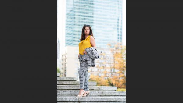 Mature woman on the concrete stairs