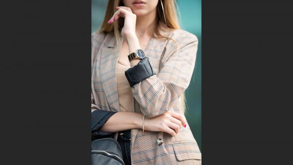 Close up to formal jacket on the girl