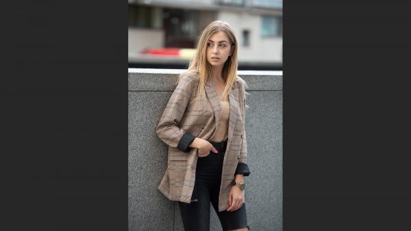 Young woman in formal jacket