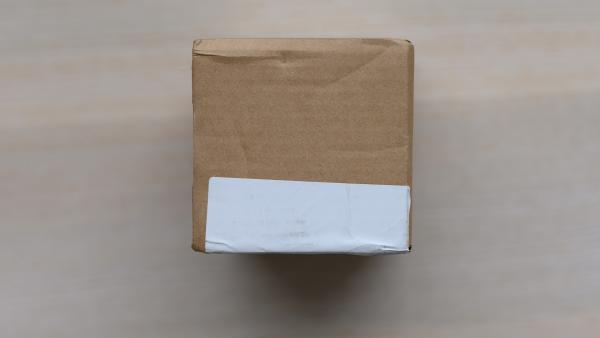 Cardboard box with shipping sticker