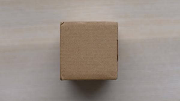 Cardboard box with shipping sticker