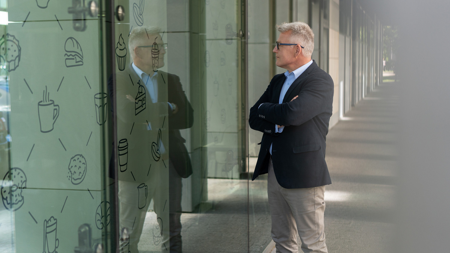 Man looking into shop photo image