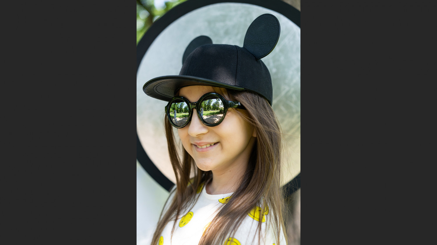 Girl in funny hat photo image