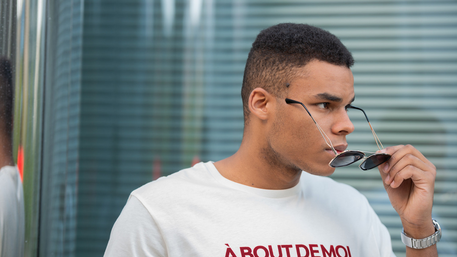 Black man take off the sunglasses image